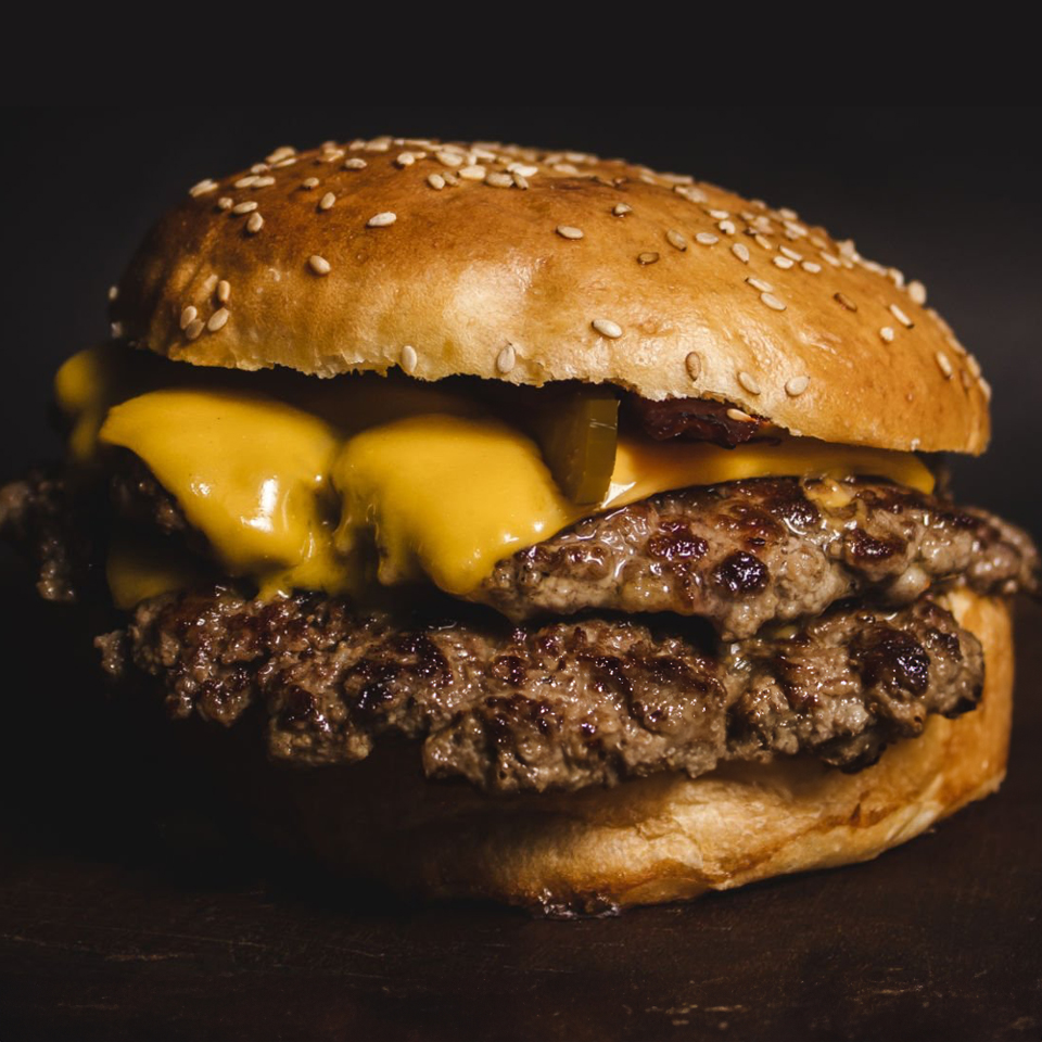 Smash Burgers recipe on the Yoder Smokers Flat Top charcoal grill